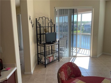 GOLF INCLUDED, second floor end unit Carriage Home with 2,045 on Colonial Country Club in Florida - for sale on GolfHomes.com, golf home, golf lot