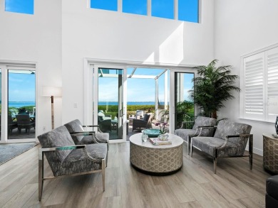 Discover the essence of waterfront elegance in this meticulously on Longboat Key Golf Club in Florida - for sale on GolfHomes.com, golf home, golf lot