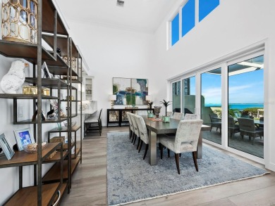 Discover the essence of waterfront elegance in this meticulously on Longboat Key Golf Club in Florida - for sale on GolfHomes.com, golf home, golf lot