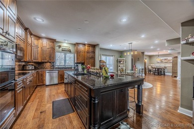 Spacious and stylish 2-story home in Horseshoe Bend on over 1 on Seasons Ridge At Four Seasons in Missouri - for sale on GolfHomes.com, golf home, golf lot