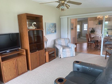 Enjoy the Florida lifestyle in this furnished mobile home in on Spanish Lakes Fairways in Florida - for sale on GolfHomes.com, golf home, golf lot