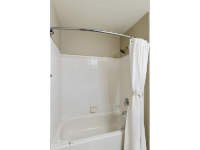 Welcome to this well-maintained 2 bedroom, 2 bath PLUS den 2,022 on Oakwood Golf Club  in Arizona - for sale on GolfHomes.com, golf home, golf lot