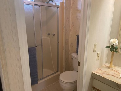 Enjoy the Florida lifestyle in this furnished mobile home in on Spanish Lakes Fairways in Florida - for sale on GolfHomes.com, golf home, golf lot