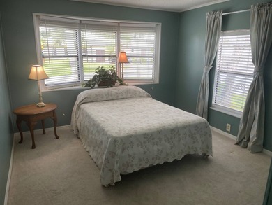 Enjoy the Florida lifestyle in this furnished mobile home in on Spanish Lakes Fairways in Florida - for sale on GolfHomes.com, golf home, golf lot