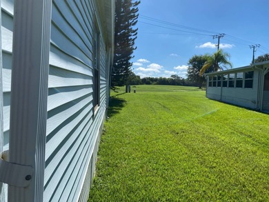 Enjoy the Florida lifestyle in this furnished mobile home in on Spanish Lakes Fairways in Florida - for sale on GolfHomes.com, golf home, golf lot