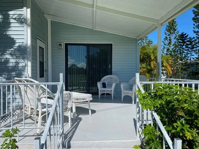 Enjoy the Florida lifestyle in this furnished mobile home in on Spanish Lakes Fairways in Florida - for sale on GolfHomes.com, golf home, golf lot