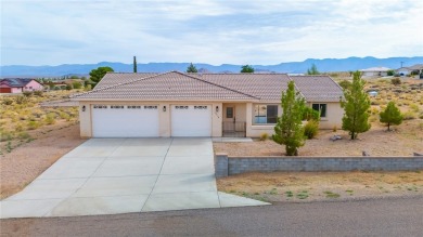 This Valle Vista home sits on nearly one-third of an acre along on Valle Vista Golf Course in Arizona - for sale on GolfHomes.com, golf home, golf lot