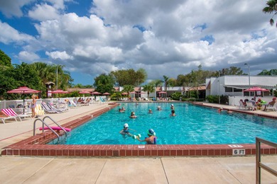 Enjoy the Florida lifestyle in this furnished mobile home in on Spanish Lakes Fairways in Florida - for sale on GolfHomes.com, golf home, golf lot