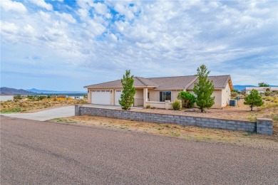 This Valle Vista home sits on nearly one-third of an acre along on Valle Vista Golf Course in Arizona - for sale on GolfHomes.com, golf home, golf lot