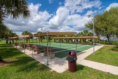 Enjoy the Florida lifestyle in this furnished mobile home in on Spanish Lakes Fairways in Florida - for sale on GolfHomes.com, golf home, golf lot