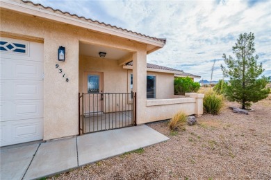 This Valle Vista home sits on nearly one-third of an acre along on Valle Vista Golf Course in Arizona - for sale on GolfHomes.com, golf home, golf lot