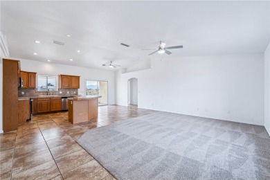 This Valle Vista home sits on nearly one-third of an acre along on Valle Vista Golf Course in Arizona - for sale on GolfHomes.com, golf home, golf lot
