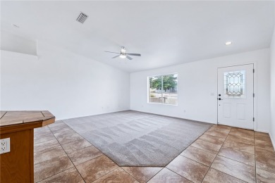 This Valle Vista home sits on nearly one-third of an acre along on Valle Vista Golf Course in Arizona - for sale on GolfHomes.com, golf home, golf lot