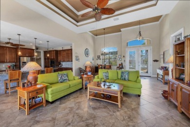 Priced to SELL this TROPICAL canal front beauty that exudes rest on Rotonda Golf and Country Club - Long Marsh  in Florida - for sale on GolfHomes.com, golf home, golf lot