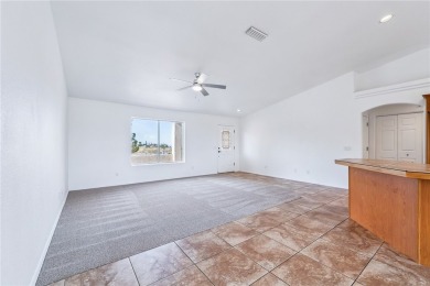 This Valle Vista home sits on nearly one-third of an acre along on Valle Vista Golf Course in Arizona - for sale on GolfHomes.com, golf home, golf lot