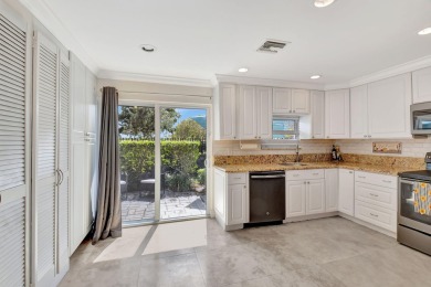 Welcome to this beautifully updated 2-bedroom, 2.5-bathroom on Broken Sound Golf and Club  in Florida - for sale on GolfHomes.com, golf home, golf lot