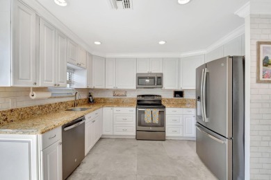 Welcome to this beautifully updated 2-bedroom, 2.5-bathroom on Broken Sound Golf and Club  in Florida - for sale on GolfHomes.com, golf home, golf lot