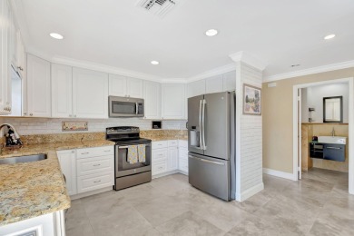 Welcome to this beautifully updated 2-bedroom, 2.5-bathroom on Broken Sound Golf and Club  in Florida - for sale on GolfHomes.com, golf home, golf lot