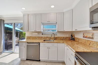 Welcome to this beautifully updated 2-bedroom, 2.5-bathroom on Broken Sound Golf and Club  in Florida - for sale on GolfHomes.com, golf home, golf lot