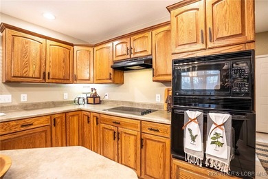 Welcome to this stunning, well maintained custom-built home on Bayview Golf Course in Missouri - for sale on GolfHomes.com, golf home, golf lot