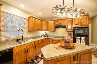 Welcome to this stunning, well maintained custom-built home on Bayview Golf Course in Missouri - for sale on GolfHomes.com, golf home, golf lot