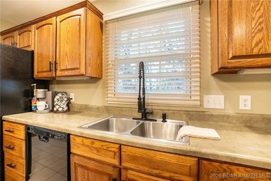 Welcome to this stunning, well maintained custom-built home on Bayview Golf Course in Missouri - for sale on GolfHomes.com, golf home, golf lot