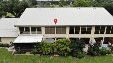 Discover elegance in this beautifully renovated townhome in on Meadowood Golf and Tennis Club in Florida - for sale on GolfHomes.com, golf home, golf lot