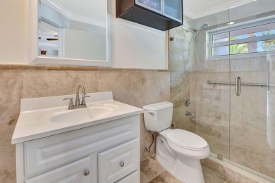 Welcome to this beautifully updated 2-bedroom, 2.5-bathroom on Broken Sound Golf and Club  in Florida - for sale on GolfHomes.com, golf home, golf lot