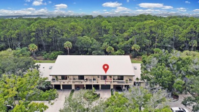 Discover elegance in this beautifully renovated townhome in on Meadowood Golf and Tennis Club in Florida - for sale on GolfHomes.com, golf home, golf lot