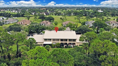 Discover elegance in this beautifully renovated townhome in on Meadowood Golf and Tennis Club in Florida - for sale on GolfHomes.com, golf home, golf lot