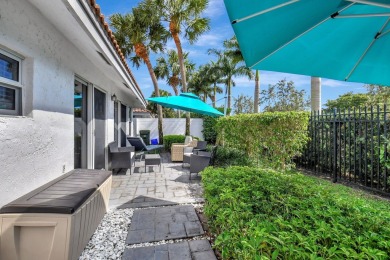 Welcome to this beautifully updated 2-bedroom, 2.5-bathroom on Broken Sound Golf and Club  in Florida - for sale on GolfHomes.com, golf home, golf lot