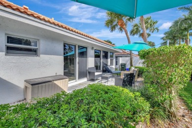 Welcome to this beautifully updated 2-bedroom, 2.5-bathroom on Broken Sound Golf and Club  in Florida - for sale on GolfHomes.com, golf home, golf lot