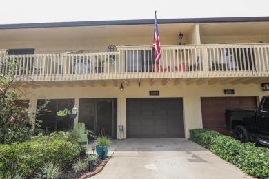 Discover elegance in this beautifully renovated townhome in on Meadowood Golf and Tennis Club in Florida - for sale on GolfHomes.com, golf home, golf lot