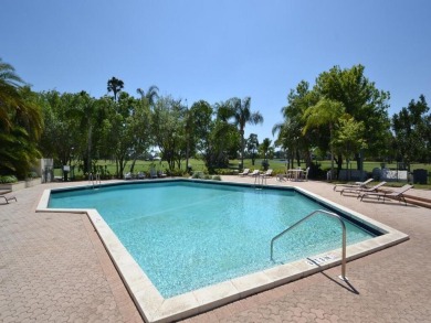 Discover elegance in this beautifully renovated townhome in on Meadowood Golf and Tennis Club in Florida - for sale on GolfHomes.com, golf home, golf lot