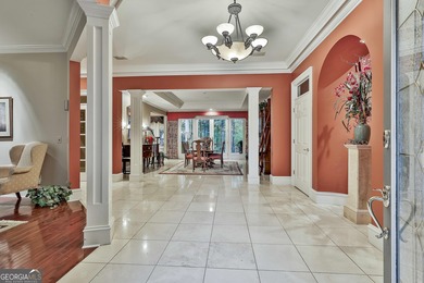 Don't miss this custom built all brick home with a 4 car garage on Whitewater Creek in Georgia - for sale on GolfHomes.com, golf home, golf lot