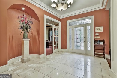 Don't miss this custom built all brick home with a 4 car garage on Whitewater Creek in Georgia - for sale on GolfHomes.com, golf home, golf lot