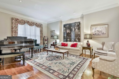 Don't miss this custom built all brick home with a 4 car garage on Whitewater Creek in Georgia - for sale on GolfHomes.com, golf home, golf lot