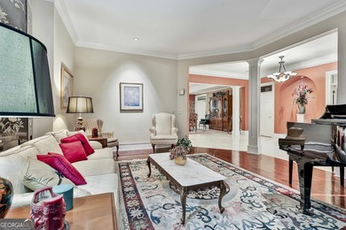Don't miss this custom built all brick home with a 4 car garage on Whitewater Creek in Georgia - for sale on GolfHomes.com, golf home, golf lot