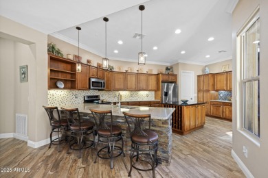 Luxurious Trilogy Home with Heated Saltwater Pool & SOLAR IS on Trilogy Golf Club At Vistancia in Arizona - for sale on GolfHomes.com, golf home, golf lot