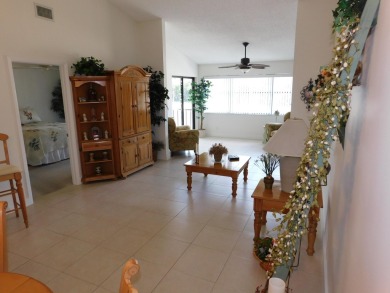 2 bedroom, 2 bath second floor unit with view of lake. Eat in on Forest Oaks Golf Club in Florida - for sale on GolfHomes.com, golf home, golf lot