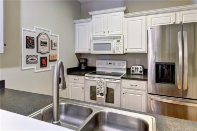 Welcome to this well-maintained 2-bedroom, 2.5-bath townhome on Williamsburg National Golf Club in Virginia - for sale on GolfHomes.com, golf home, golf lot