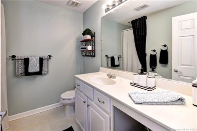 Welcome to this well-maintained 2-bedroom, 2.5-bath townhome on Williamsburg National Golf Club in Virginia - for sale on GolfHomes.com, golf home, golf lot