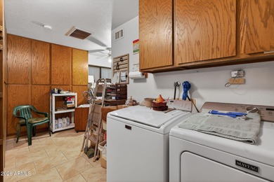 Well maintained and move-in ready 800 model is one of the on Sunland Village Golf Club in Arizona - for sale on GolfHomes.com, golf home, golf lot