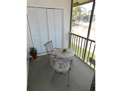 2 bedroom, 2 bath second floor unit with view of lake. Eat in on Forest Oaks Golf Club in Florida - for sale on GolfHomes.com, golf home, golf lot