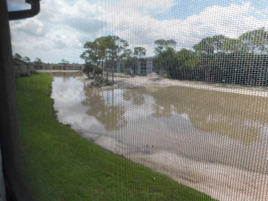 2 bedroom, 2 bath second floor unit with view of lake. Eat in on Forest Oaks Golf Club in Florida - for sale on GolfHomes.com, golf home, golf lot