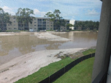 2 bedroom, 2 bath second floor unit with view of lake. Eat in on Forest Oaks Golf Club in Florida - for sale on GolfHomes.com, golf home, golf lot