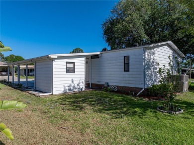 Beautiful 2 bedroom 2 bath Manufactured home in the 55+ Gated on Highland Fairways Golf Club in Florida - for sale on GolfHomes.com, golf home, golf lot