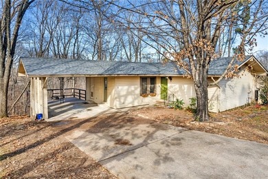 Well-maintained and thoughtfully updated, this three-bedroom on Bella Vista Country Club - Berksdale in Arkansas - for sale on GolfHomes.com, golf home, golf lot