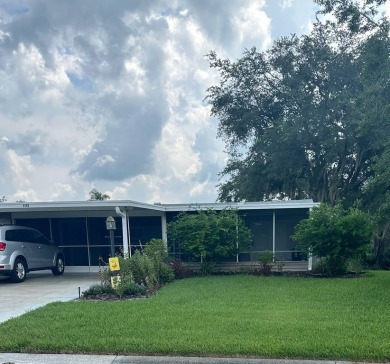 Manufactured Home on Leased Land with Lot Rent. Nestled in the on Whisperwood Golf Course in Florida - for sale on GolfHomes.com, golf home, golf lot