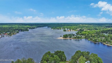 Wake up every morning to a beautiful lake view in this fully on Lake Tansi Village Country Club in Tennessee - for sale on GolfHomes.com, golf home, golf lot